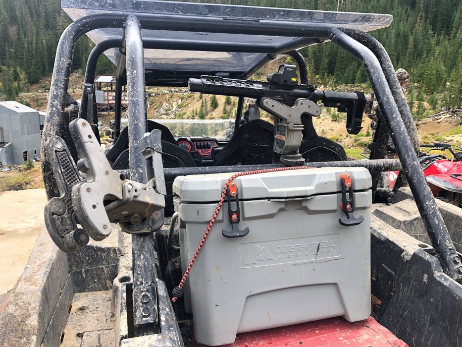 two 1082 gun racks were plunged through mud in the back of a utv