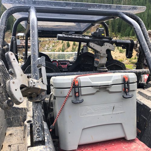 two 1082 gun racks were plunged through mud in the back of a utv