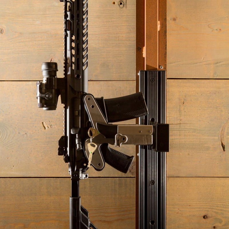 wall mounted 1086 gun rack with t-channel holding sig mdx